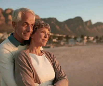 imgi_126_elderly-couple-standing-together-and-embracing-on-the-beach